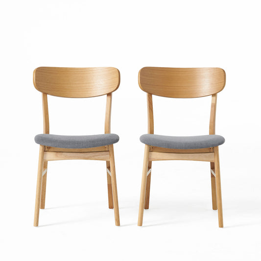 The Brilliantine Dining Chair With Cushion And Wood Frame (Set of 2) features two wooden chairs with curved backrests and light gray upholstered seats, shown side by side on a white background.