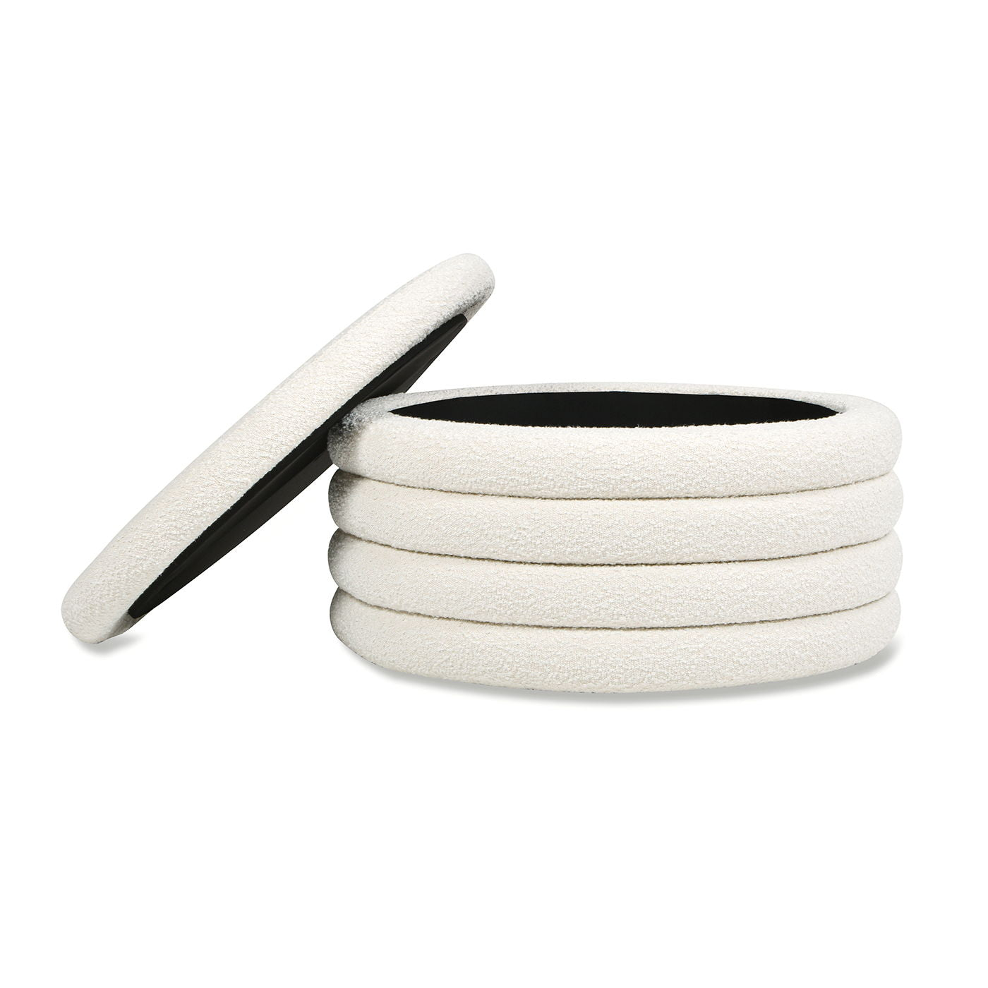 The Fuji - Oversized Round Storage Ottoman features a soft, sherpa-like surface in white with textured detailing and a contrasting black inner lining for added style.