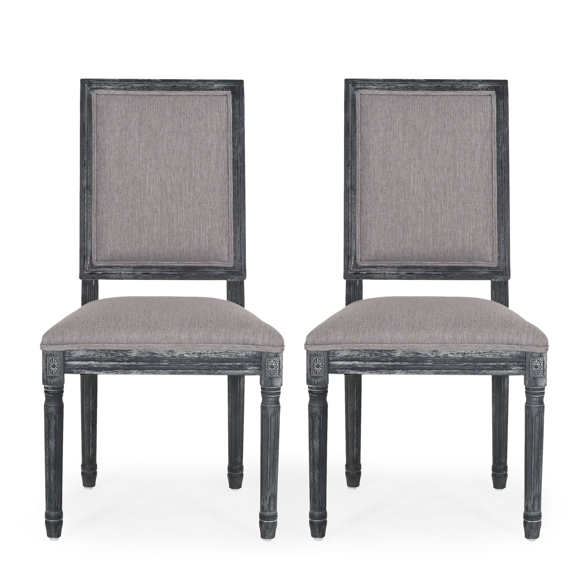 Two French Country Style Dining Chairs with fluted legs and upholstered light gray seats and backs, featuring dark gray frames, are positioned side by side facing forward against a white background.