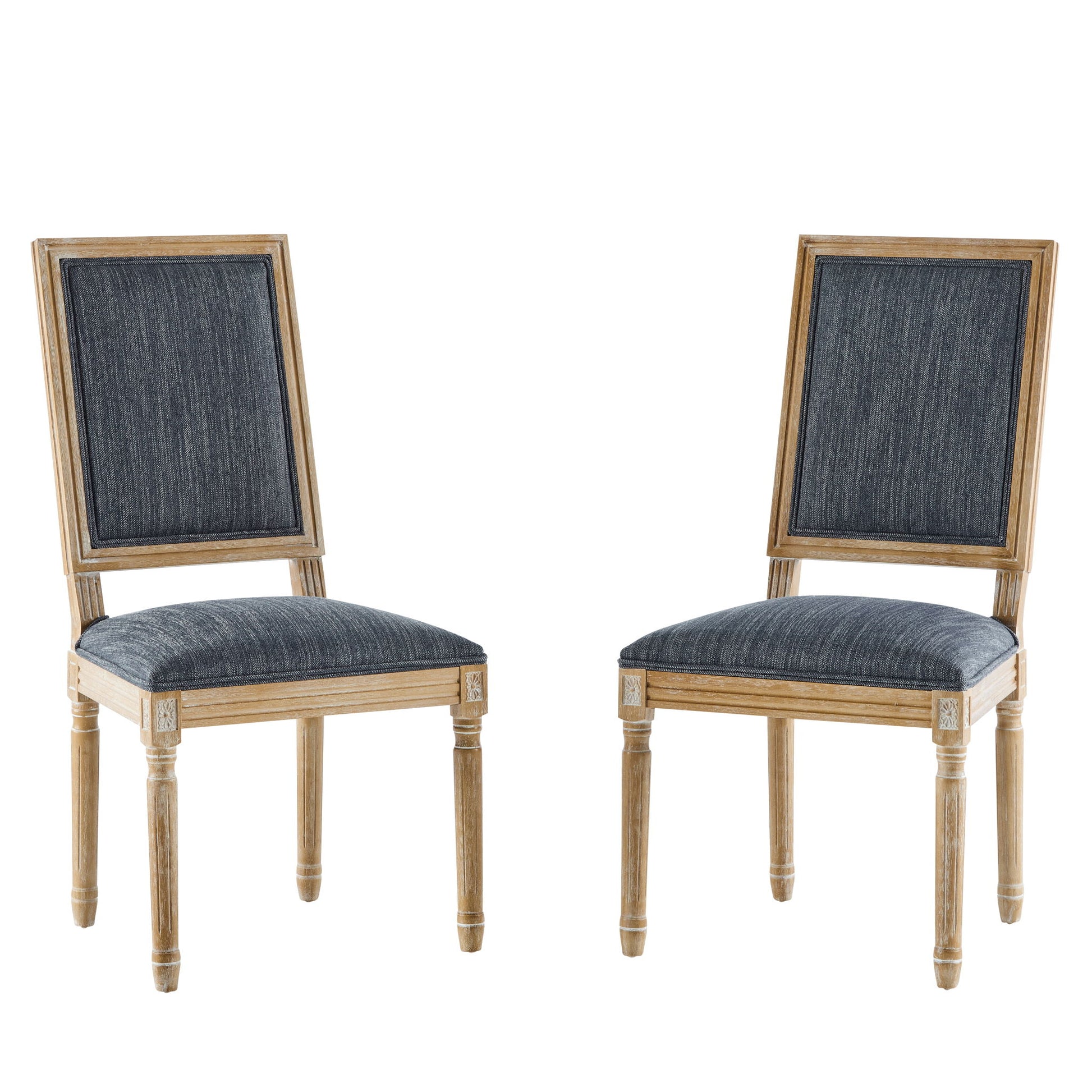 Two French Country Style Dining Chairs feature rectangular backs, dark blue upholstered seats and backrests, and light-colored carved wooden frames with fluted legs. The chairs are placed slightly facing each other.