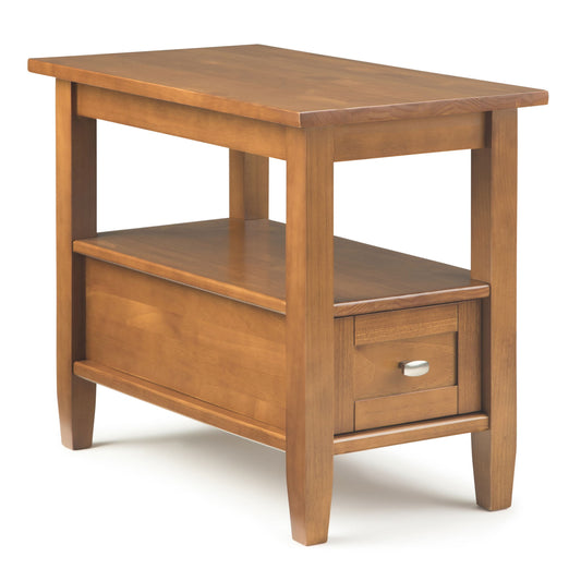 The Warm Shaker - Handcrafted Table features a rectangular top, lower shelf, and small drawer with metal handle, all in a warm brown finish with simple, sturdy legs.
