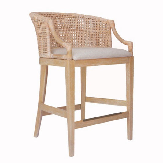 The Casual Handcrafted Rattan Counter Stool features a wooden frame, woven rattan backrest, curved armrests, and a light cushioned seat, shown against a plain white background.