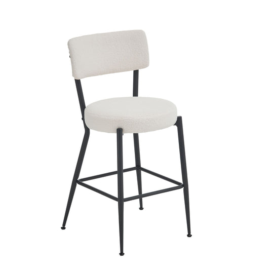 The Modern Teddy Fabric Upholstered Bar Stool features a round, cushioned white seat with matching backrest, supported by sleek black metal legs and a footrest.