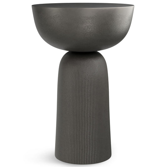 The Hughes - Cast Aluminum Side Table features a modern, sculptural design with a wide shallow top and tall ribbed cylindrical base, all in a matte black finish.
