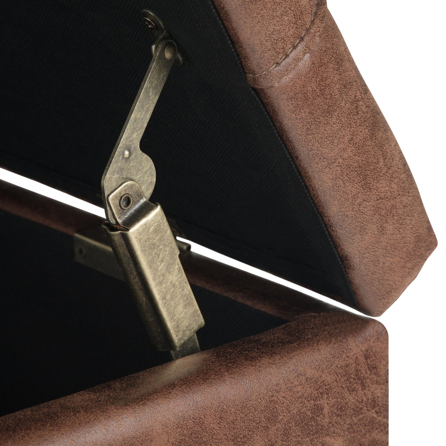 Close-up of the Harrison - Upholstered Coffee Table Storage Ottoman with its lid open, revealing a metal hinge mechanism and leather-like textured fabric.