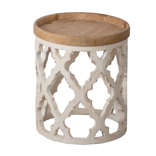 The Stylish Rustic Round Wooden Table features a small, light wood top and a white, openwork geometric lattice base with a decorative carved wood pattern.