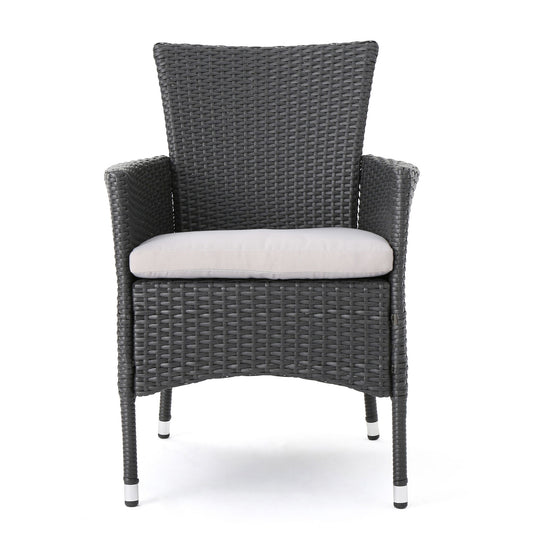 Set of 2 Dimensional Outdoor Dining Chairs with black woven rattan, armrests, light gray seat cushions, and iron frames, shown from the front on a white background.