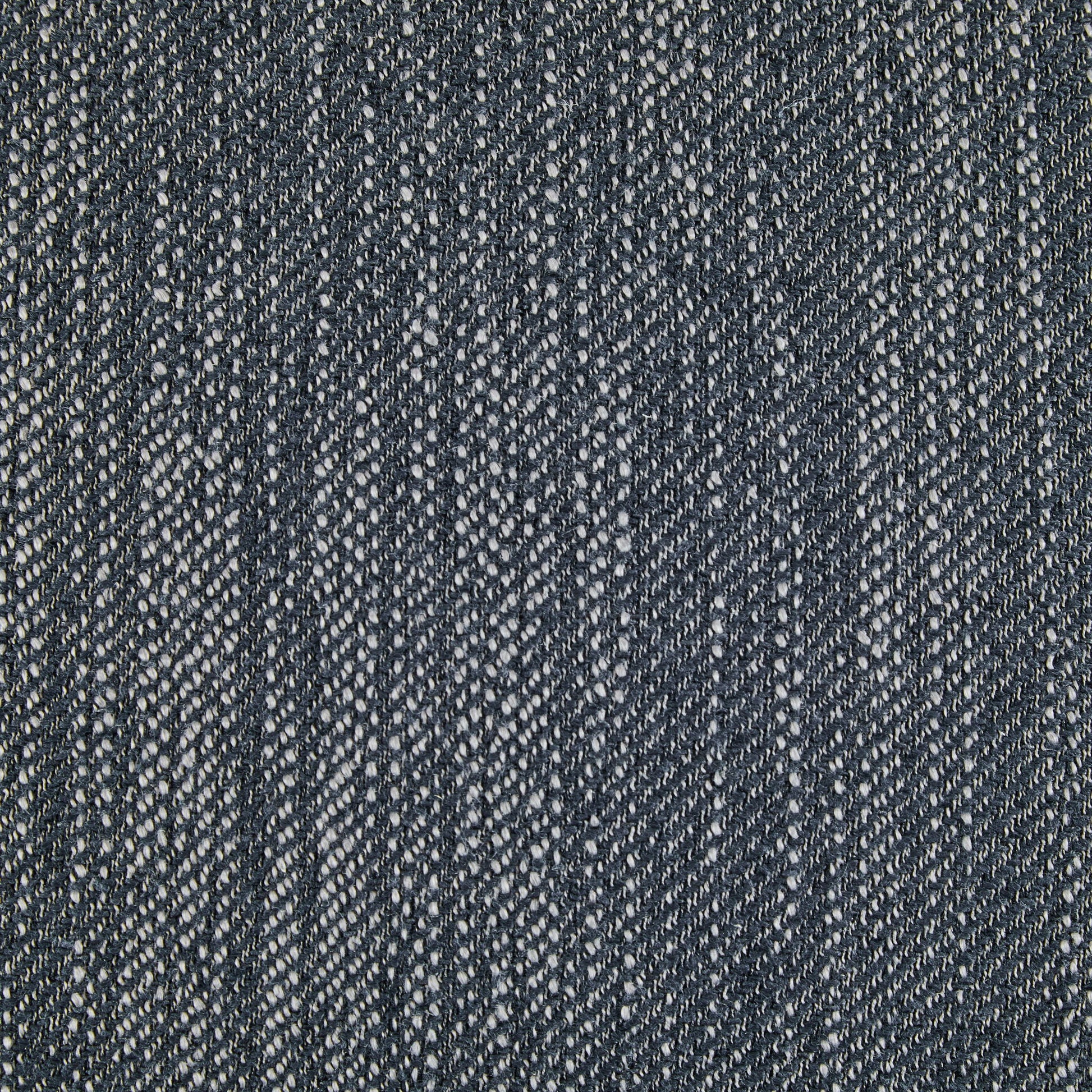 Close-up view of the French Country Dining Chair's smooth upholstered seating shows its detailed woven texture with visible threads.