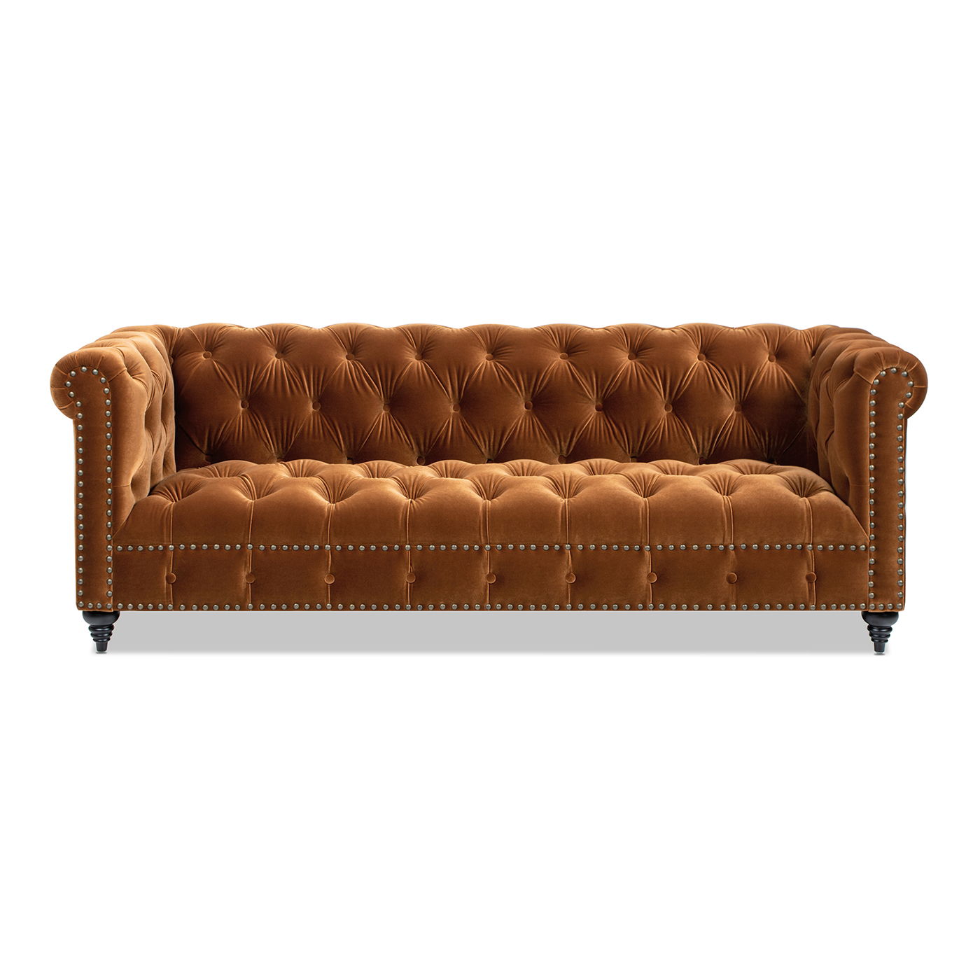 The Alto Tufted Chesterfield Sofa is shown from the front against a white background. This brown velvet sofa features deep button tufting, rolled arms, and nailhead trim.