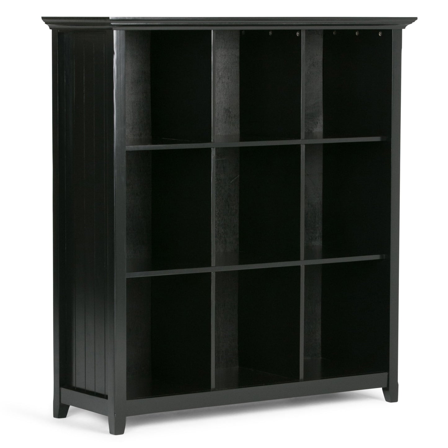 The Acadian - Handcrafted Cube Storage is a black wooden shelving unit with nine open cubby compartments in a 3x3 layout, featuring a simple, modern design, flat top, and decorative side panels.