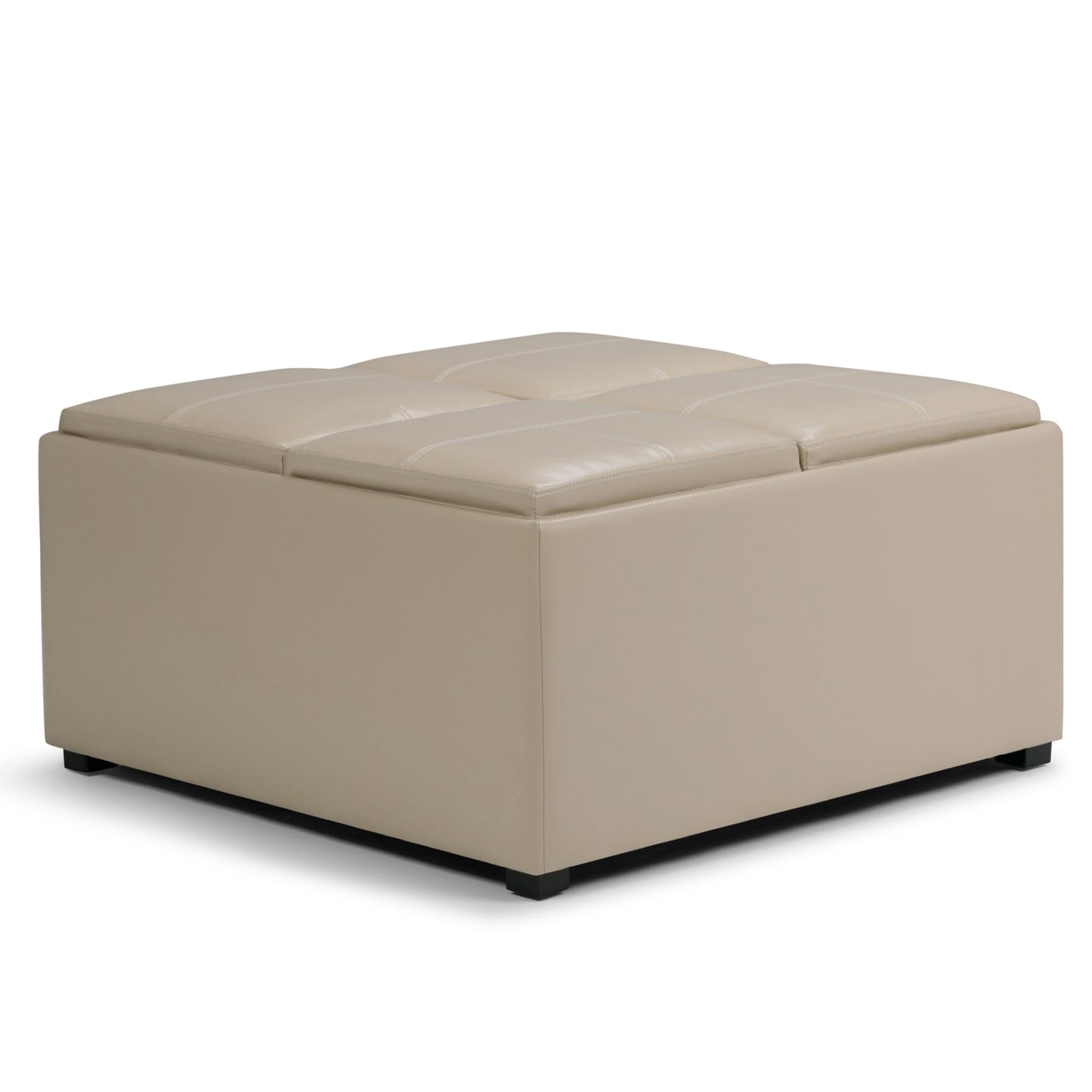 The Avalon Square Coffee Table, Storage Ottoman features a modern beige design with a cushioned tufted top, smooth sides, and small black feet.