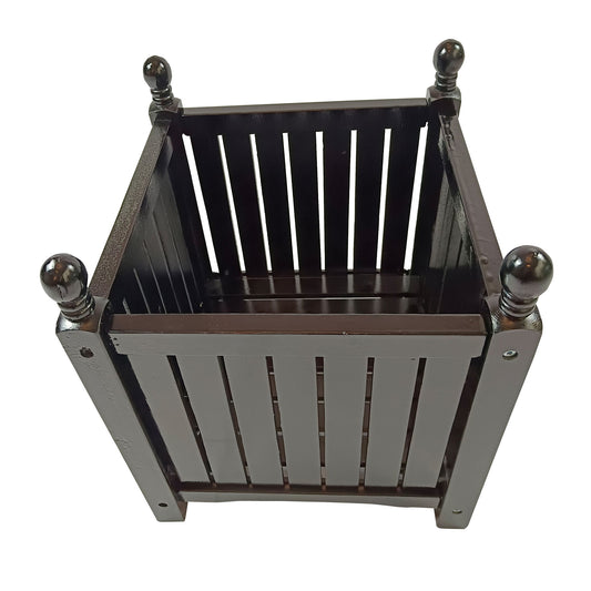 The Outdoor Square Flower And Herb Pot is a black planter with vertical slats and decorative rounded finials on each corner, perfect for gardens, porches, or patios. The empty container is shown from a slightly elevated angle.