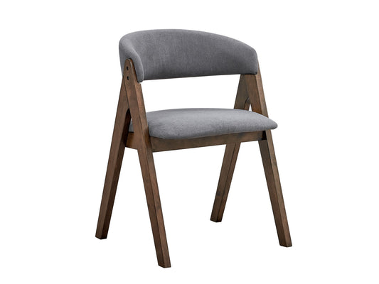 The Keiki Side Chair (Set of 2) in gray features a modern curved backrest, cushioned gray fabric seat, and wooden legs and frame finished in warm brown.