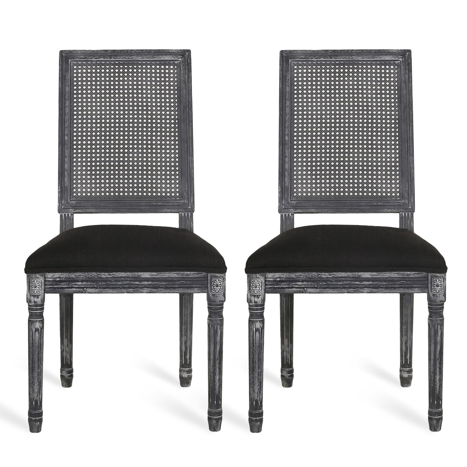 Pair of French Country Dining Chairs with rectangular cane backrests and smooth upholstered seats, featuring carved details on the legs and corners in a dark wood finish.