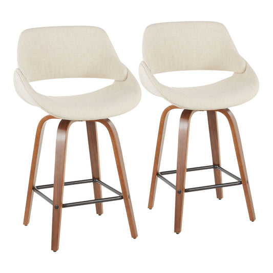The Fabrico Mid-Century Modern Counter Stools (Set of 2) feature light beige cushioned seats, curved backrests, and wooden legs with black metal footrests, shown against a white background.