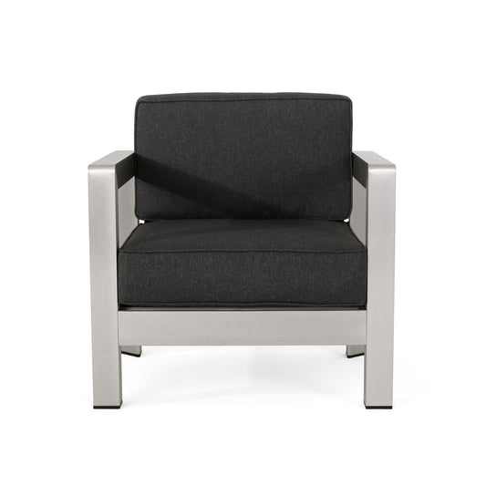 The Aviara - Luxurious Outdoor Club Chair features a matte silver metal frame with dark gray cushioned seat and backrest, displayed front-facing against a white background.