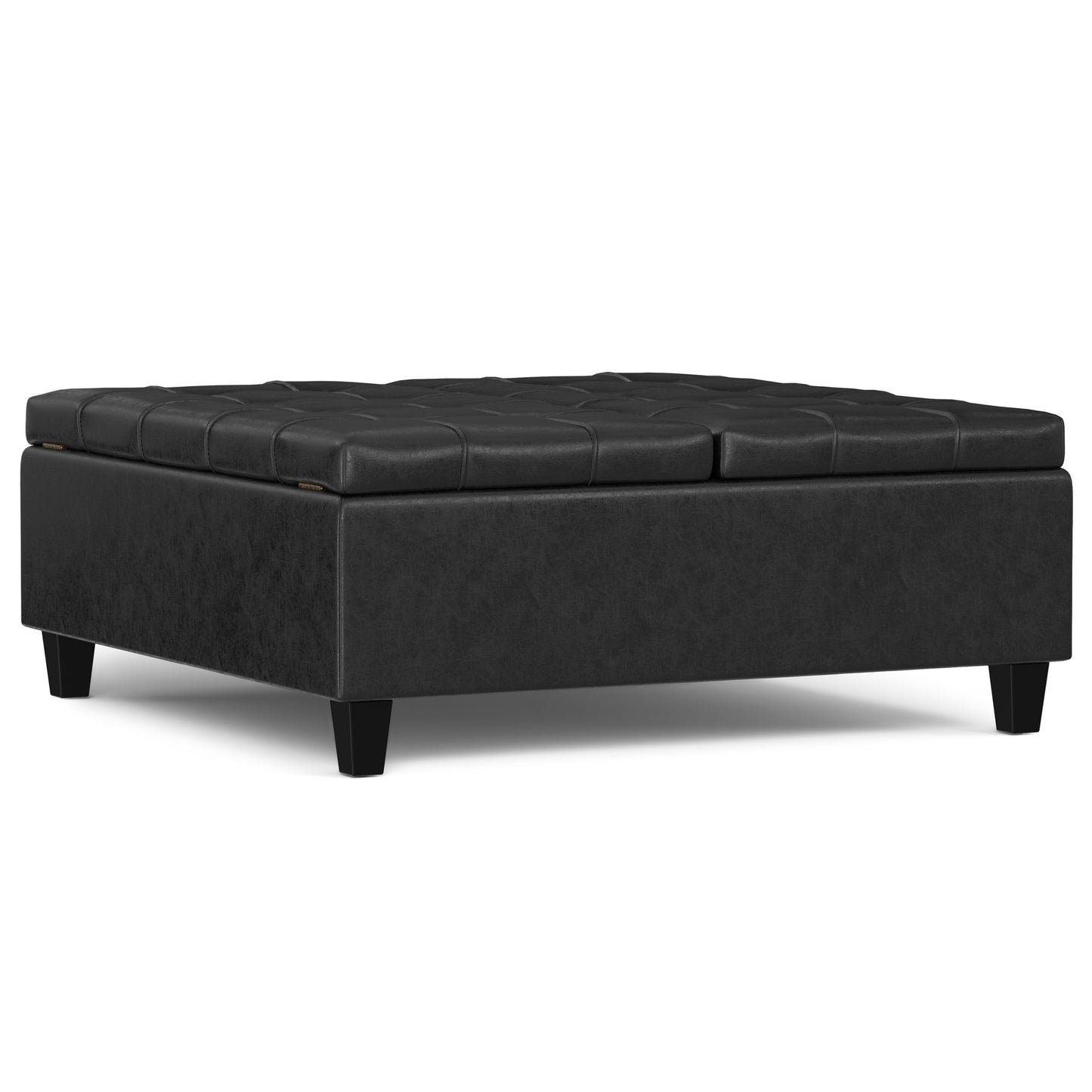 The Harrison - Upholstered Coffee Table Storage Ottoman is a large, square, black ottoman with short tapered legs and a tufted top, shown against a plain white background.