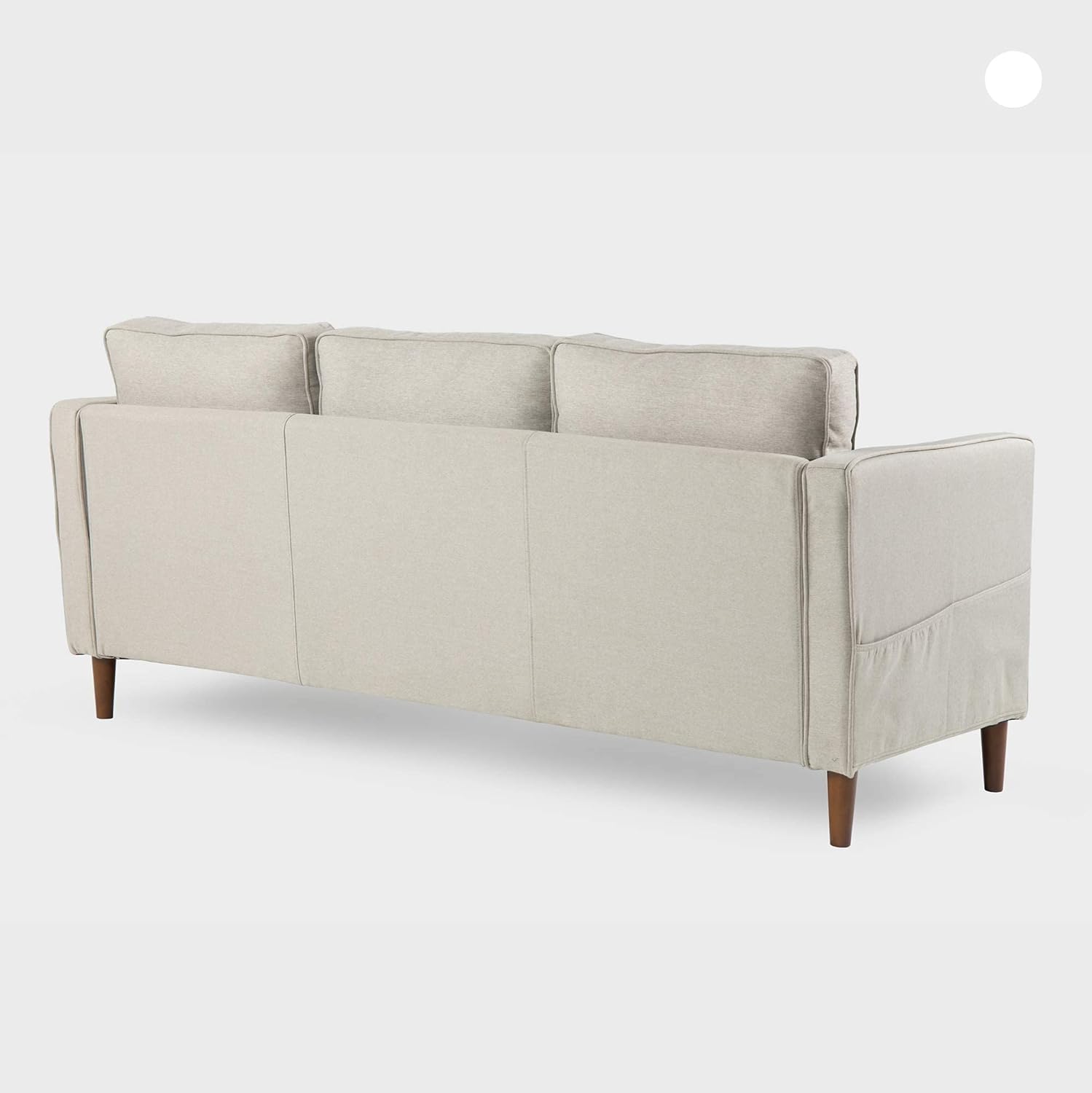 The Mellow Modern Loveseat with Armrest Pockets is shown from the back in light beige, highlighting its clean lines, cushioned backrests, and wooden legs against a plain light gray background.