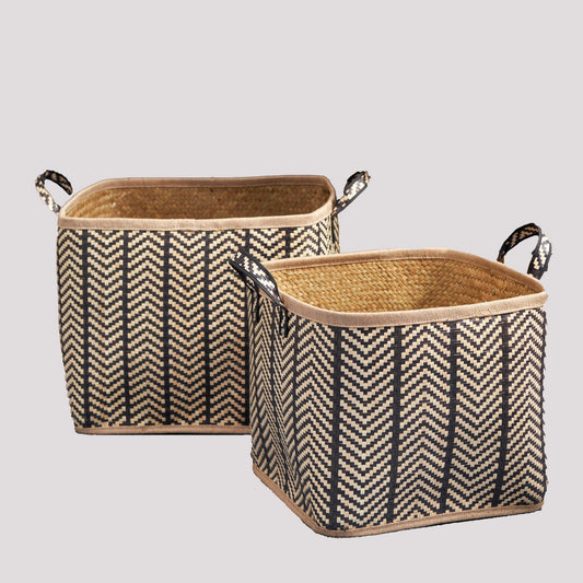 Set of 2 square palm leaf woven wicker storage baskets in black/brown with handles, displayed side by side against a plain background.