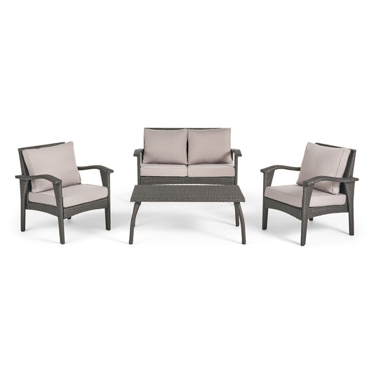 The Honolulu - Wicker Set Outdoor Seating is a four-piece patio set with two armchairs, a loveseat, and a rectangular coffee table, all made of gray wicker frames and light gray cushions.