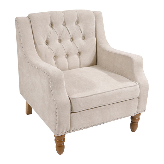 Beige button-tufted upholstered accent chair with vintage brass studs, curved armrests, and wooden turned legs—perfect as a comfy living room, bedroom, or reception room reading chair.