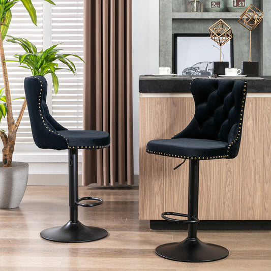 A set of two Swivel Velvet Barstools with adjustable seat height and tufted backs are placed beside a kitchen island, complemented by modern decor including a potted plant and beige curtains.