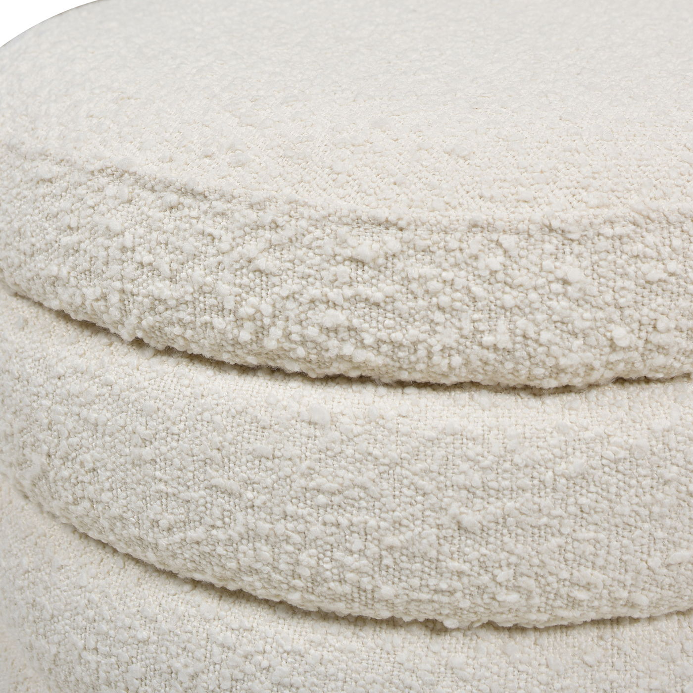 Close-up of the Fuji - Oversized Round Storage Ottoman, featuring a soft, textured boucle fabric in an off-white shade that highlights its cozy and woven appearance.
