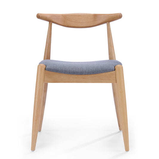 The Candescent Dining Chair (Set of 2) features a curved back, wood frame, angled legs, and a cushioned gray fabric seat, displayed against a plain white background.
