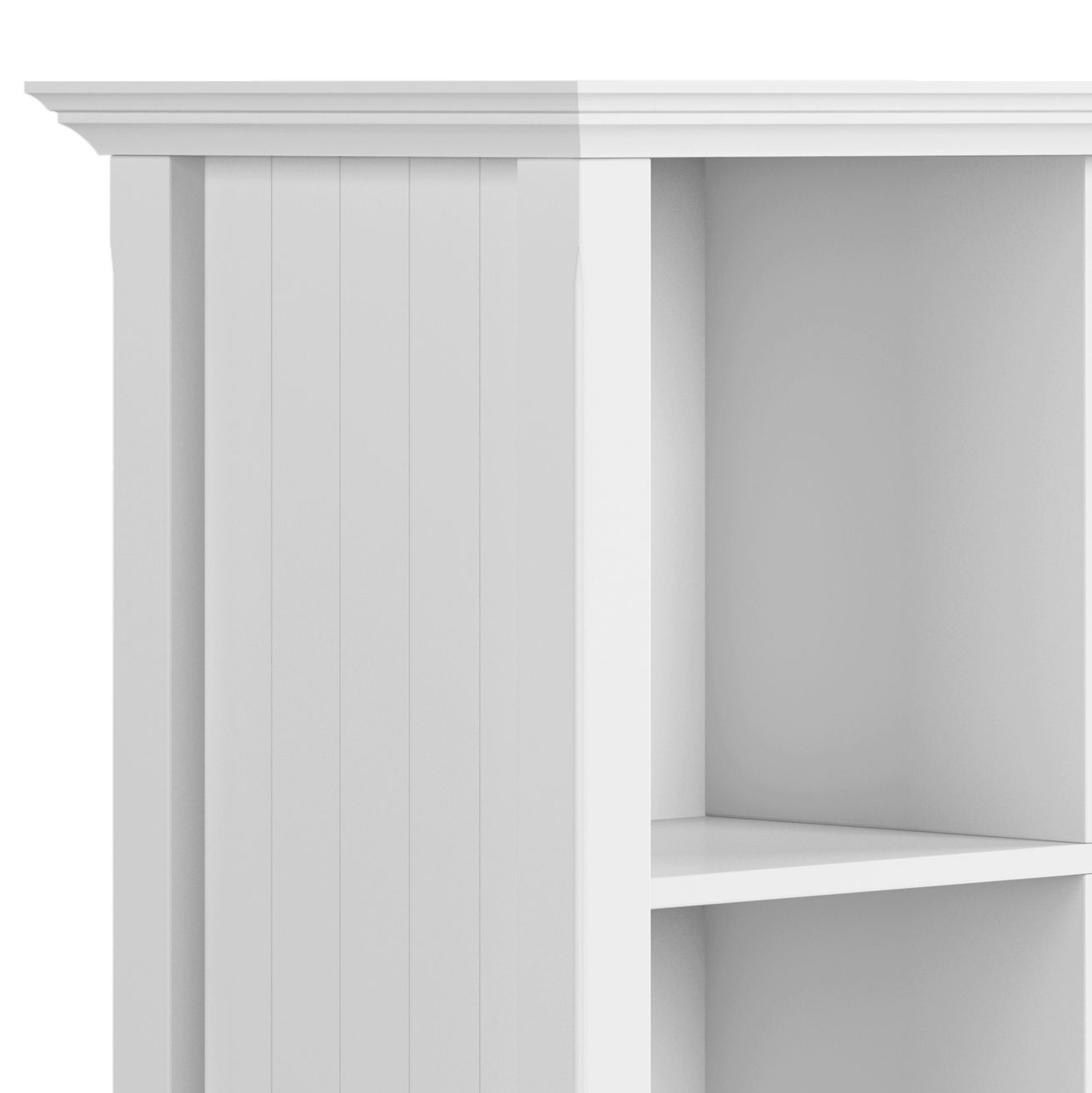 Close-up of the upper left corner of the Acadian - Handcrafted Cube Storage, featuring white wood, decorative crown molding on top, vertical grooves on the side panel, and one visible shelf inside.