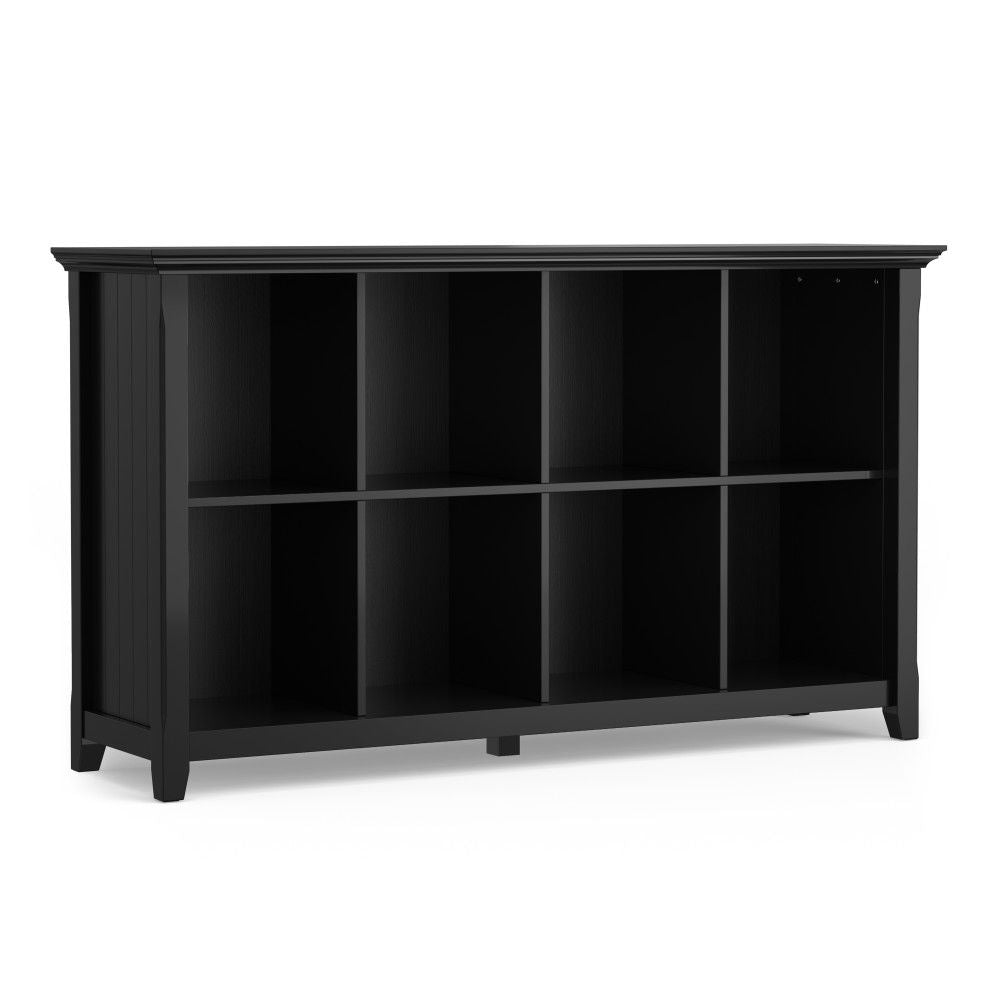 The Acadian - Handcrafted Cube Storage is a black wooden shelf unit with eight open cubbies and short legs, featuring a simple modern design ideal for organizing books, bins, or decor.