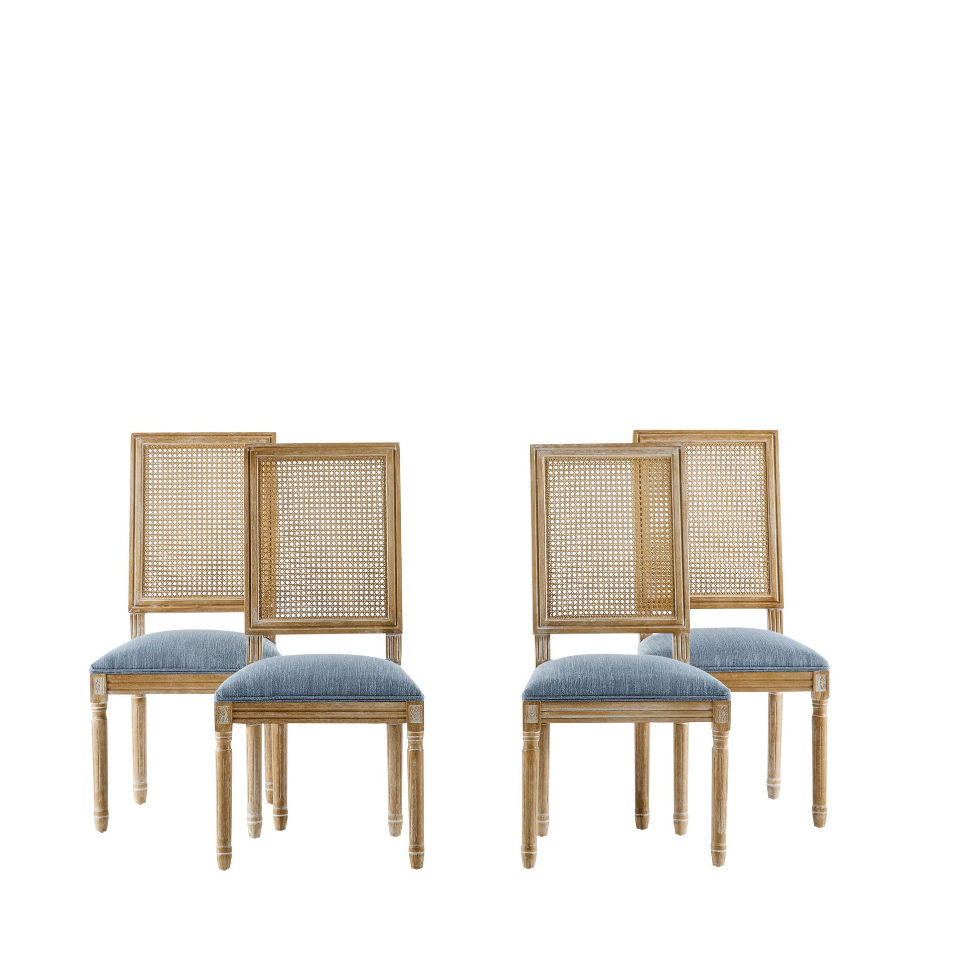 Four French Country Dining Chairs with rectangular cane backrests and smooth light blue upholstered seats, arranged in two pairs against a white background.