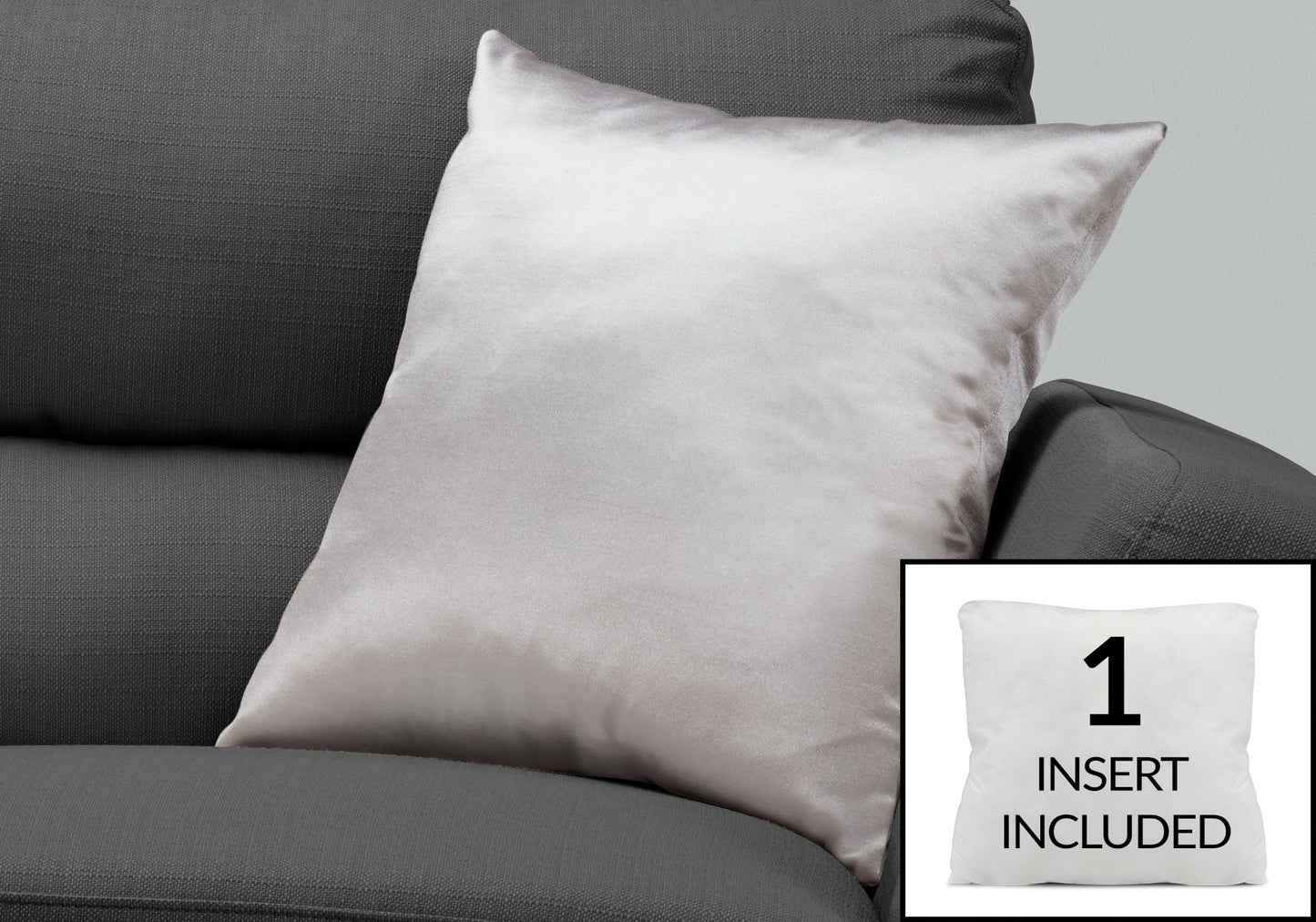 A square light gray decorative throw pillow (insert included, hypoallergenic) sits on a dark gray sofa. An inset shows another pillow with “1 INSERT INCLUDED” to highlight the included insert.