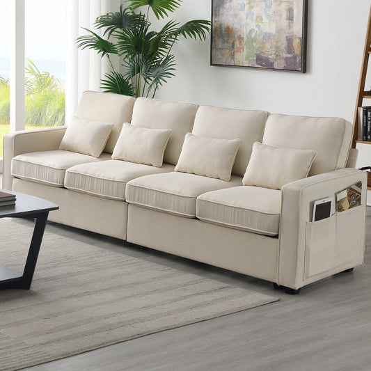 A modern living room featuring a 4 Seater Modern Linen Sofa with armrest pockets and 4 pillows, a gray area rug, coffee table, potted plant, and wall art for a minimalist style.