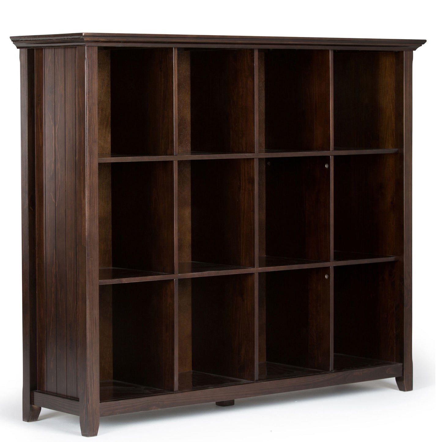 The Acadian - Handcrafted Cube Storage is a dark wood bookshelf featuring twelve square cubbies in a 3x4 grid, shown at an angle to display the front and side. It has a simple, classic look.