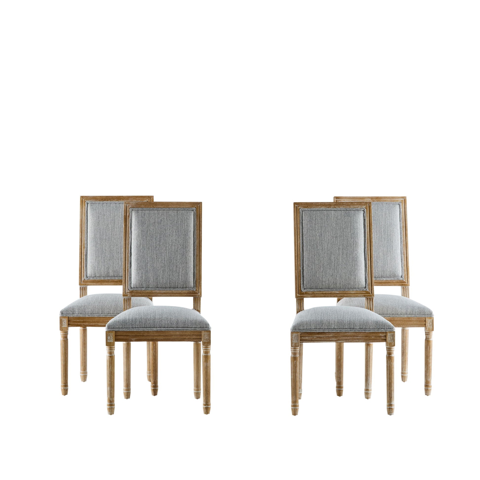 Four French Country Style dining chairs with upholstered seats and fluted legs, arranged in two pairs against a white background.