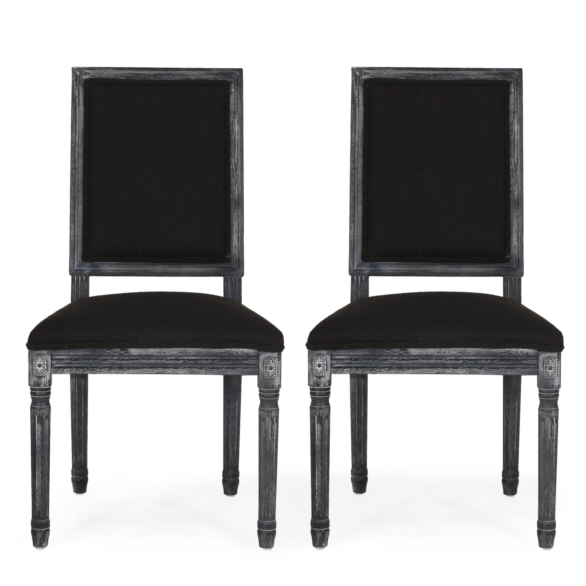 Two French Country Style Dining Chairs with upholstered seats, fluted legs, and square backs in black, feature dark wood frames and are positioned side by side against a plain white background.