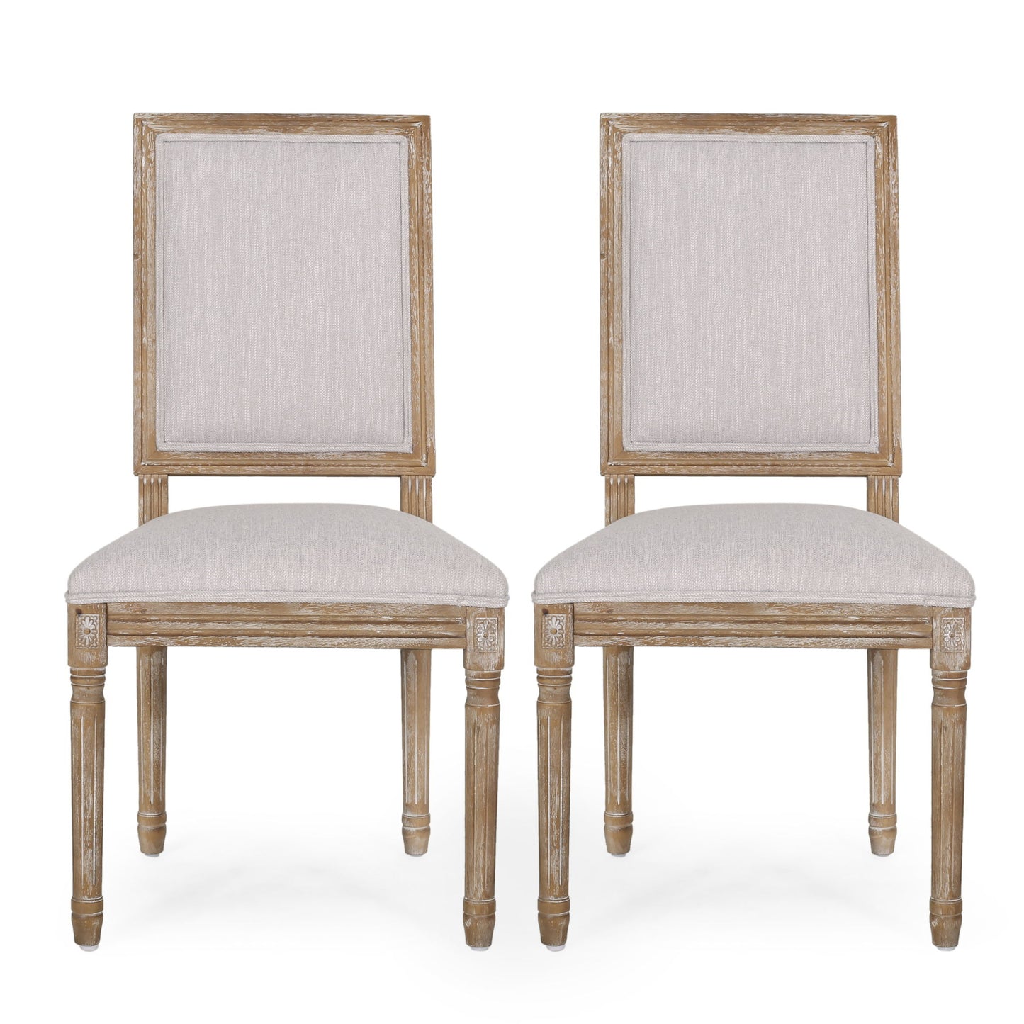 Two French Country Style Dining Chairs with light beige upholstered seats and backs, fluted legs, and a classic design are placed side by side facing forward against a white background.