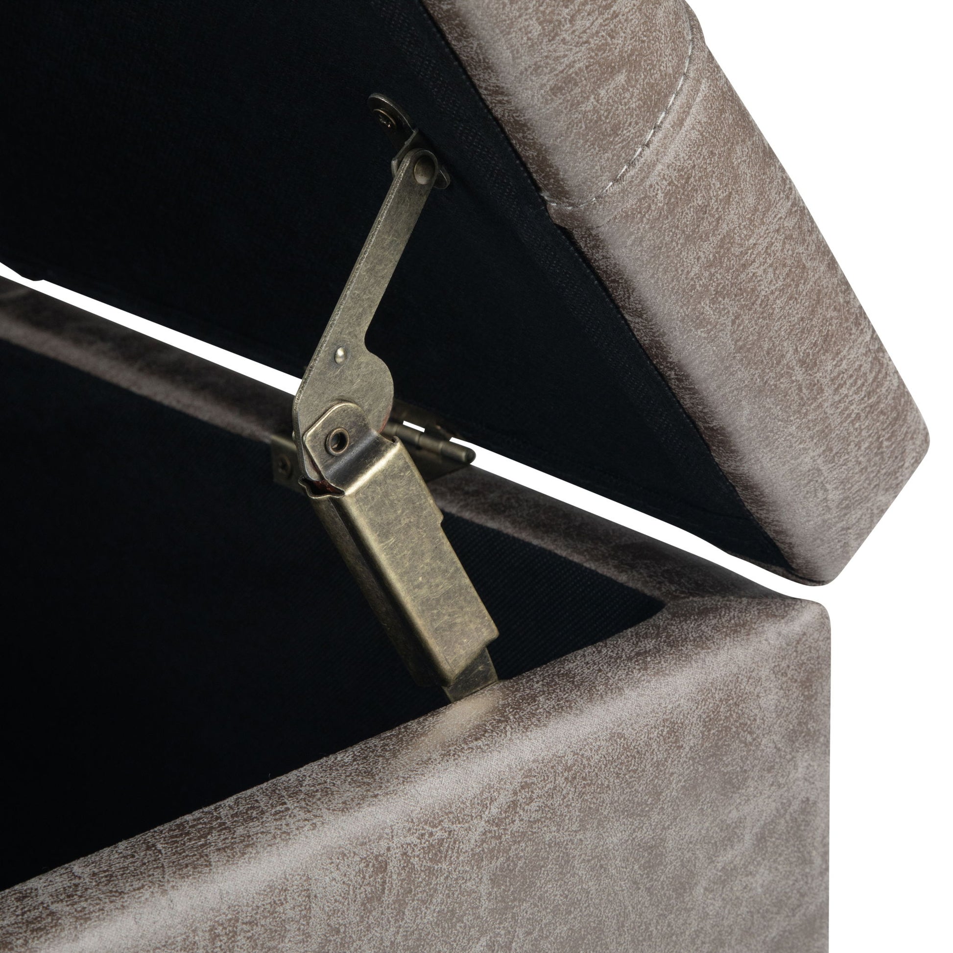 Close-up of the Harrison Upholstered Coffee Table Storage Ottoman with hinged lid partially open, revealing the metal hinge and textured light brown upholstery.