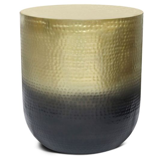 The Nova Handcrafted Metal Side Table features a round, hammered metal design with a gold-to-black gradient finish. It has a smooth, flat top and no visible legs for a sleek, modern look.