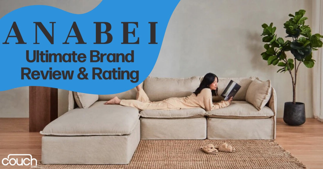 A person lounges on a beige sectional sofa, reading a magazine. The room has wooden flooring, a large potted plant, and soft lighting. Text on the image reads, "ANABEI Ultimate Brand Review & Rating." Logo at the bottom left says "couch.com.