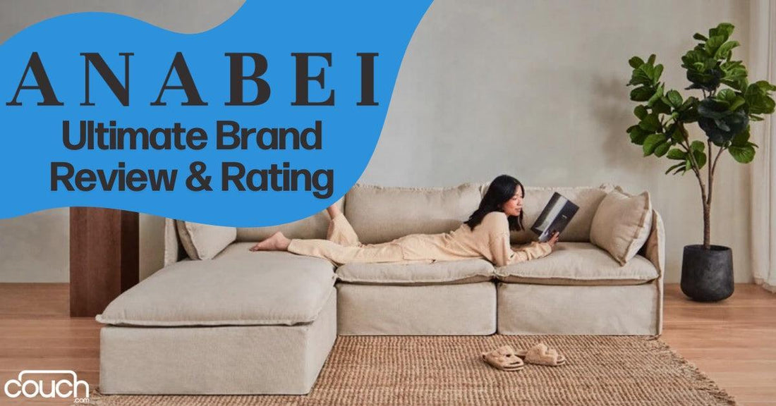 A person lounges on a beige sectional sofa, reading a magazine. The room has wooden flooring, a large potted plant, and soft lighting. Text on the image reads, "ANABEI Ultimate Brand Review & Rating." Logo at the bottom left says "couch.com.