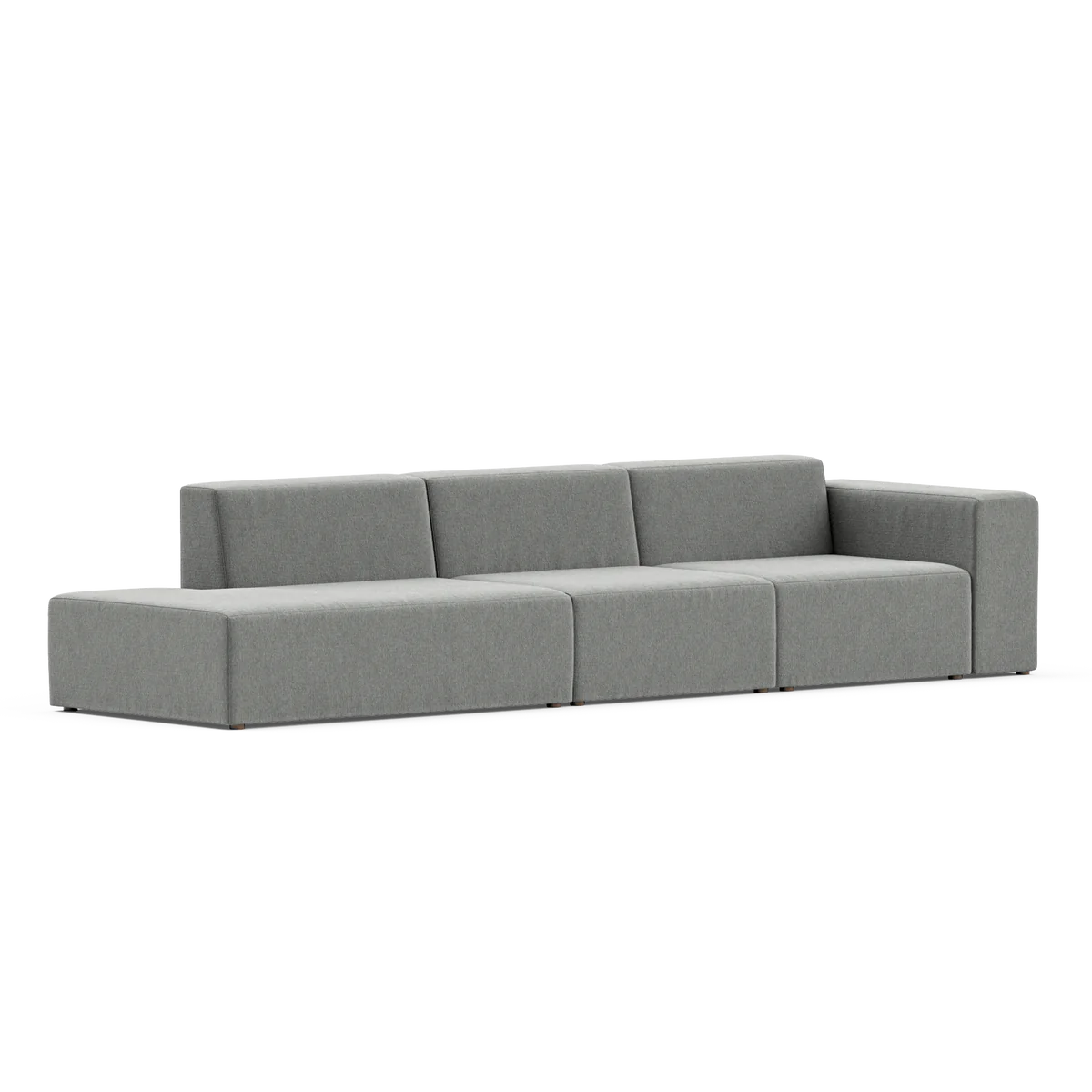 The Three-Seater Form Sectional is a modern and minimalist gray sofa featuring three seat sections and a low backrest, designed with clean lines and a boxy shape. It sits on a flat surface in a well-lit environment.