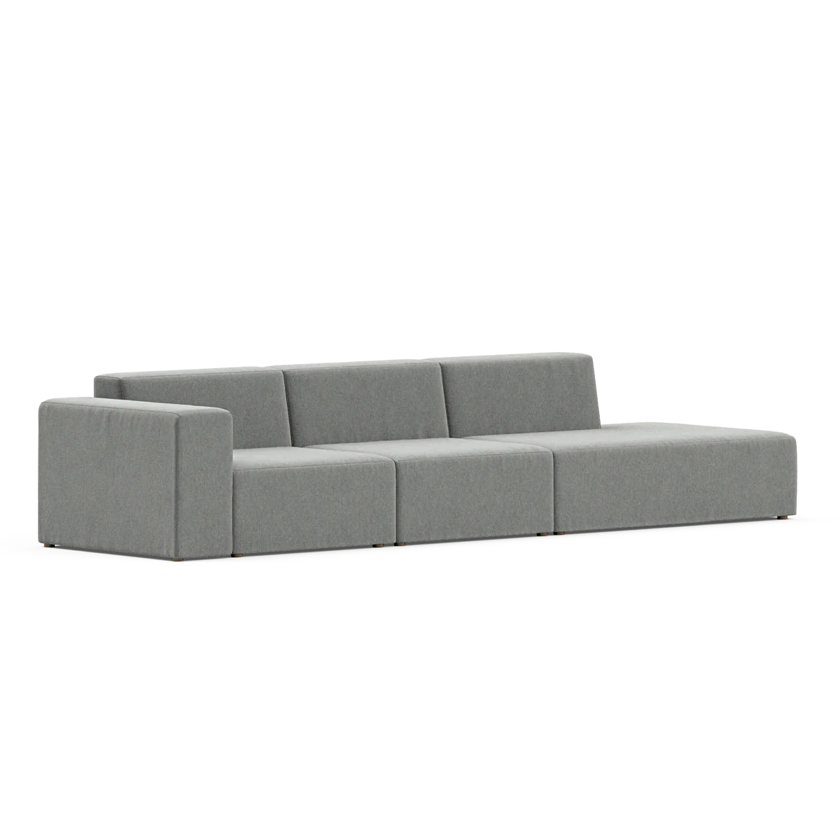 The Three-Seater Form Sectional is a modern, minimalist gray sofa featuring low armrests, elegantly displayed against a plain white background.