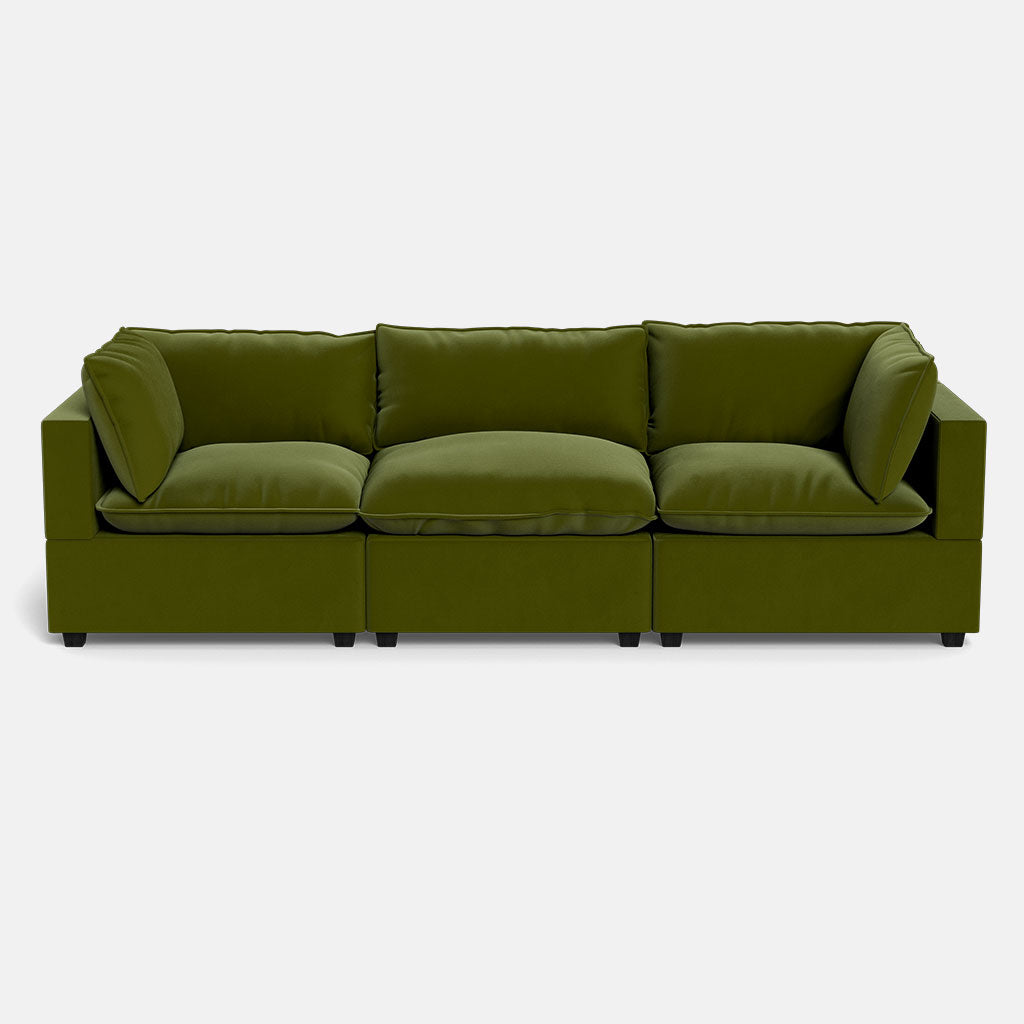 The Kova Pillow Cushion Sofa 122" is a modern green three-seater with thick cushions, square armrests, and a low profile, shown against a plain white background.
