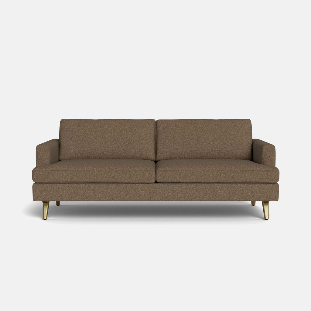 The Lido Sofa 75" features modern brown fabric, two seat and back cushions, straight arms, and four angled wooden legs, displayed against a plain white background.