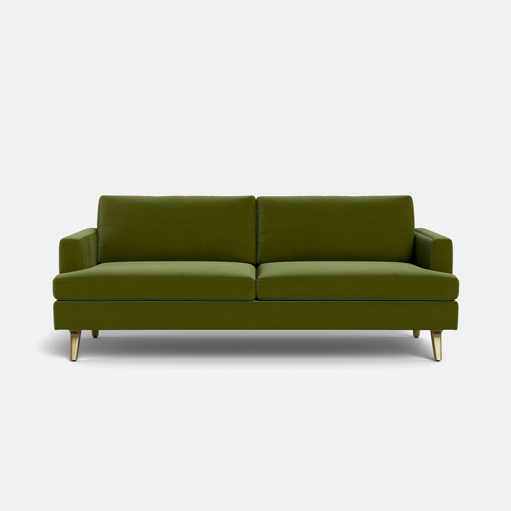 The Lido Sofa 75" is a modern green sofa with clean lines, two seat cushions, and angled wooden legs, displayed against a plain white background.