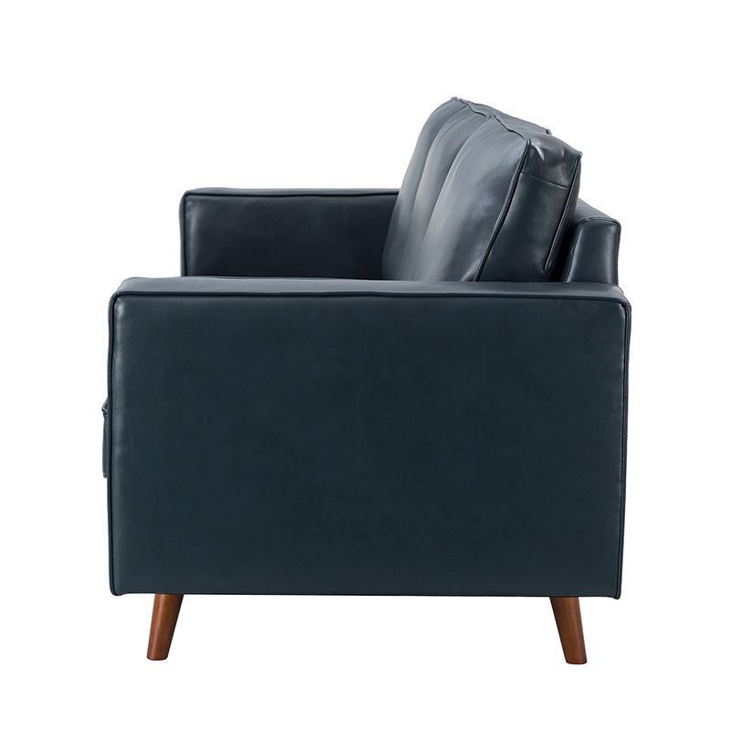 Side view of the Anatole Leather Sofa in a modern dark green with wooden legs. The sofa boasts a sleek design, featuring a cushioned back and armrests.