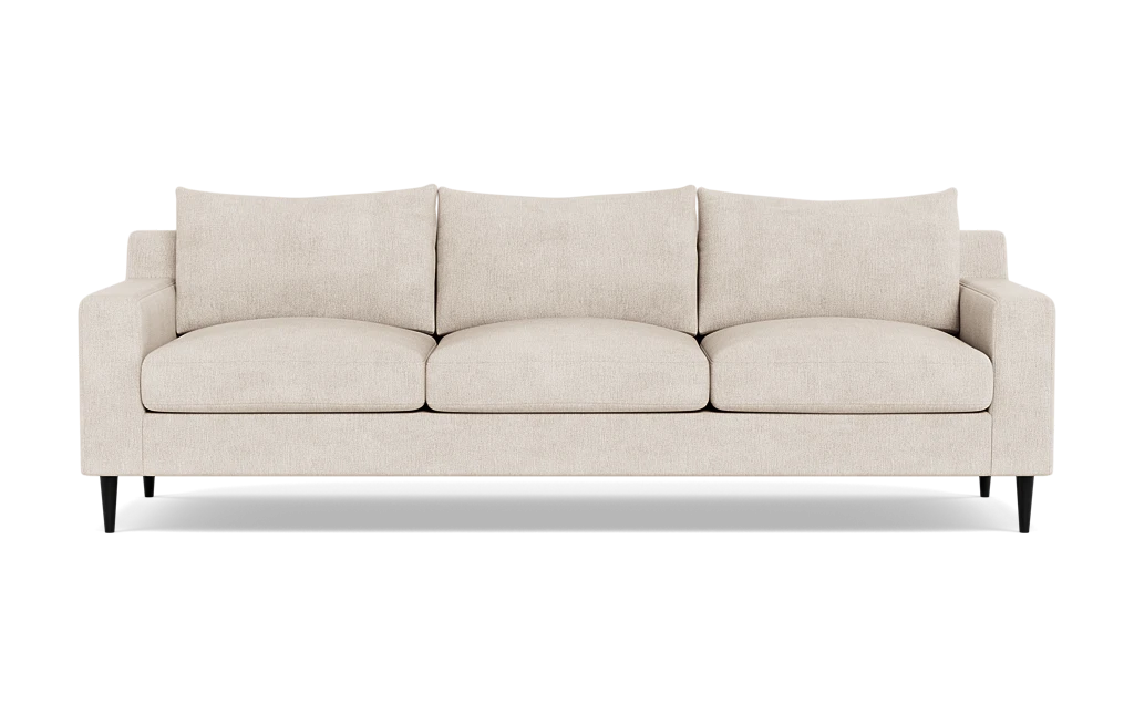 The Sloan Custom 3-Seat 95" Sofa features a beige upholstery with smooth finish, complemented by three plush and comfortable cushions. It has straight armrests and stands on four dark legs, all set against a white background.