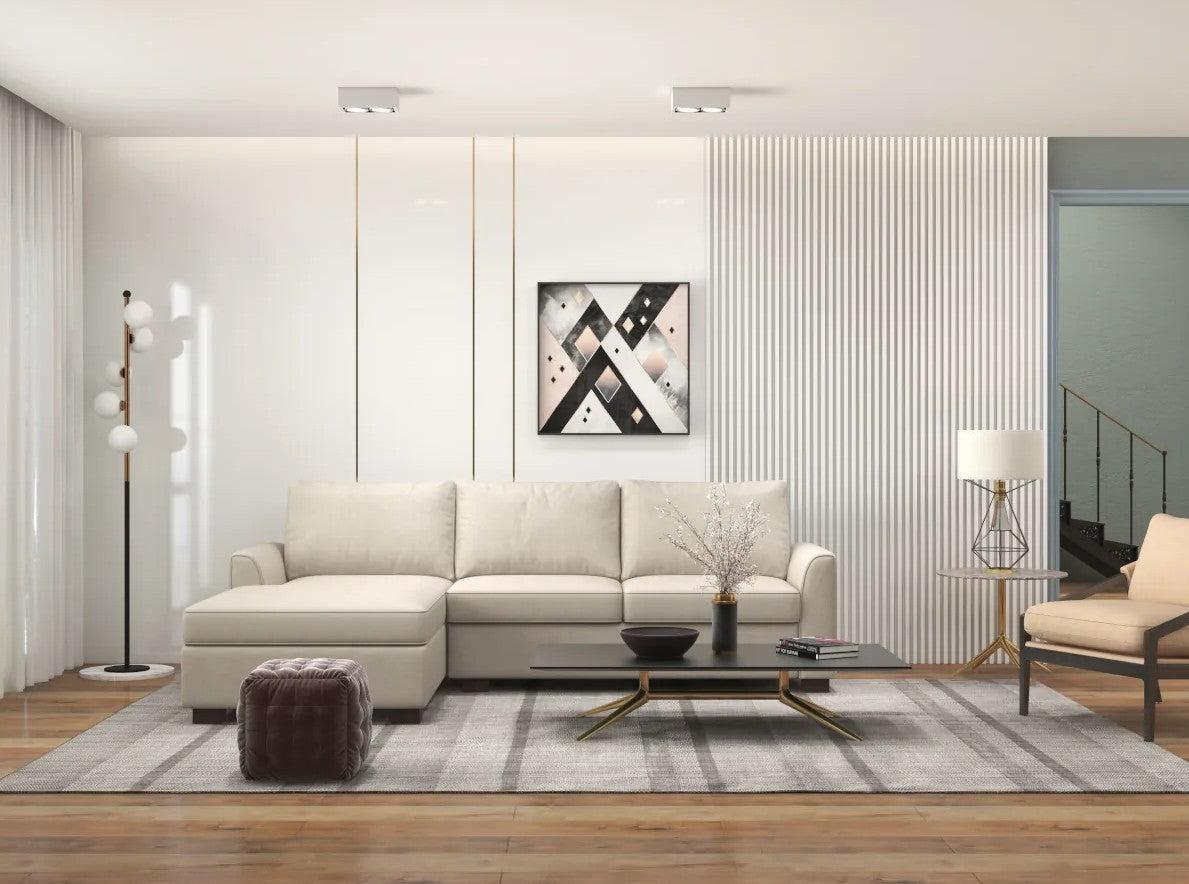White sectional on a striped gray carpet in a white living room.