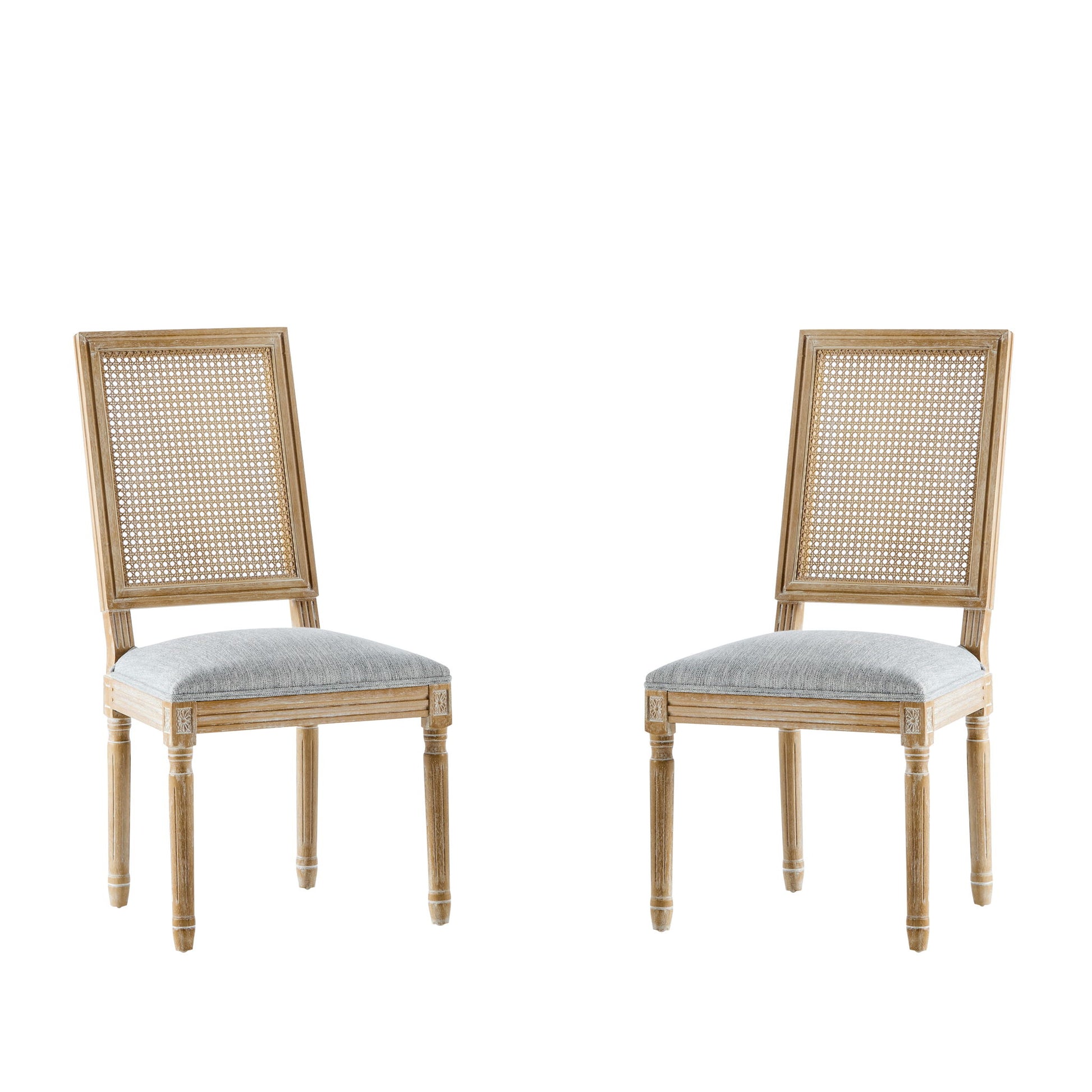 Two French Country Dining Chairs with rectangular cane backrests and smooth upholstered seats, featuring carved legs and a classic, elegant design, are set against a plain white background.